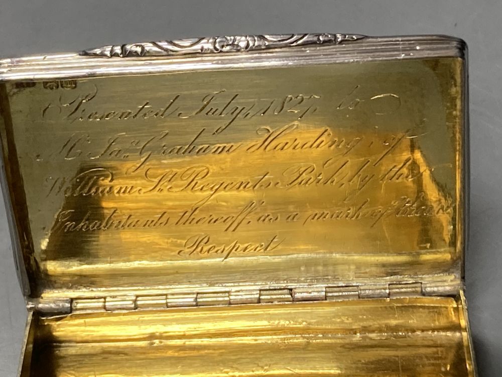 A George IV ribbed silver rectangular snuff box, RD, London, 1827, with engraved inscription to lid interior, 68mm.